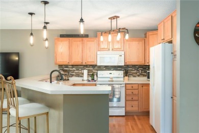 Discover this stunning end-unit townhome in the vibrant Wild on The Wilds Golf Club in Minnesota - for sale on GolfHomes.com, golf home, golf lot