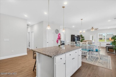 Discover exceptional living at 195 Hawks Run Drive in Eagle Run on Crow Creek Golf Club in North Carolina - for sale on GolfHomes.com, golf home, golf lot