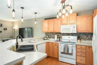 Discover this stunning end-unit townhome in the vibrant Wild on The Wilds Golf Club in Minnesota - for sale on GolfHomes.com, golf home, golf lot