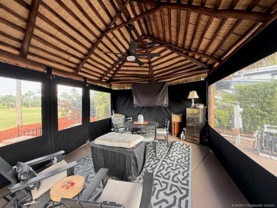 This beautifully landscaped tiki lot offers breathtaking sunset on Motorcoach Resort Golf Course in Florida - for sale on GolfHomes.com, golf home, golf lot