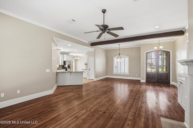 Welcome to this beautiful home located in the highly desirable on Lake Caroline Golf Club in Mississippi - for sale on GolfHomes.com, golf home, golf lot