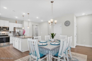 Discover exceptional living at 195 Hawks Run Drive in Eagle Run on Crow Creek Golf Club in North Carolina - for sale on GolfHomes.com, golf home, golf lot