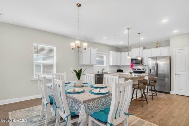 Discover exceptional living at 195 Hawks Run Drive in Eagle Run on Crow Creek Golf Club in North Carolina - for sale on GolfHomes.com, golf home, golf lot