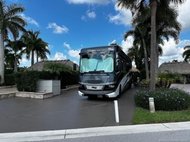This beautifully landscaped tiki lot offers breathtaking sunset on Motorcoach Resort Golf Course in Florida - for sale on GolfHomes.com, golf home, golf lot