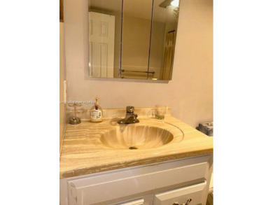 HOLLYBROOK IS A PRESTIGIOUS COMMUNITY NESTED IN SOUTH BROWARD on Hollybrook Golf and Tennis Club  in Florida - for sale on GolfHomes.com, golf home, golf lot