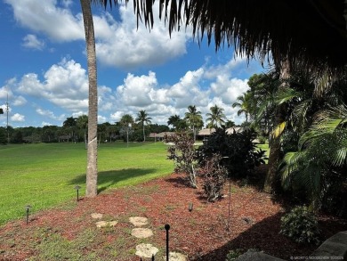 This beautifully landscaped tiki lot offers breathtaking sunset on Motorcoach Resort Golf Course in Florida - for sale on GolfHomes.com, golf home, golf lot