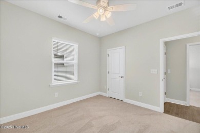 Discover exceptional living at 195 Hawks Run Drive in Eagle Run on Crow Creek Golf Club in North Carolina - for sale on GolfHomes.com, golf home, golf lot