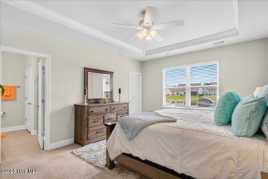 Discover exceptional living at 195 Hawks Run Drive in Eagle Run on Crow Creek Golf Club in North Carolina - for sale on GolfHomes.com, golf home, golf lot