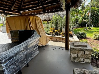 This beautifully landscaped tiki lot offers breathtaking sunset on Motorcoach Resort Golf Course in Florida - for sale on GolfHomes.com, golf home, golf lot