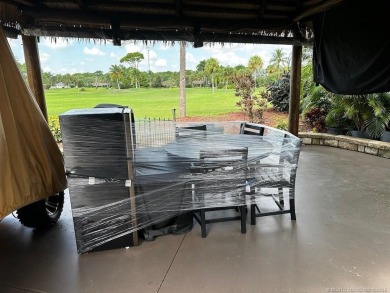 This beautifully landscaped tiki lot offers breathtaking sunset on Motorcoach Resort Golf Course in Florida - for sale on GolfHomes.com, golf home, golf lot