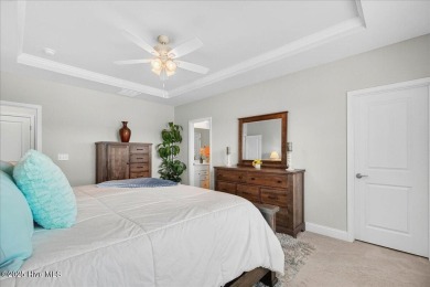 Discover exceptional living at 195 Hawks Run Drive in Eagle Run on Crow Creek Golf Club in North Carolina - for sale on GolfHomes.com, golf home, golf lot