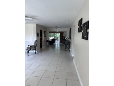 55+ age restricted single family home on golf course, walk to on Forest Oaks Golf Club in Florida - for sale on GolfHomes.com, golf home, golf lot