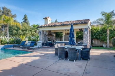 This stunning Spanish-style home offers timeless elegance with 4 on Copper River Country Club in California - for sale on GolfHomes.com, golf home, golf lot