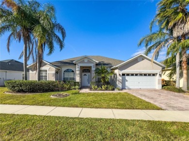 This beautiful home features 4 bedrooms and 3 bathrooms, plus a on Highlands Reserve Golf Club in Florida - for sale on GolfHomes.com, golf home, golf lot
