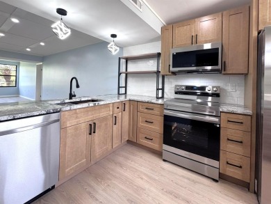 SPECTACULAR! Don't miss this MOVE-IN READY, COMPLETELY REMODELED on Bear Lakes Country Club in Florida - for sale on GolfHomes.com, golf home, golf lot