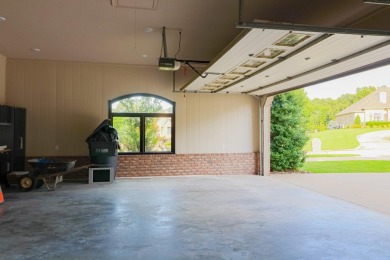 This stunning all-brick home, has been completely remodeled to on RidgePointe Country Club in Arkansas - for sale on GolfHomes.com, golf home, golf lot