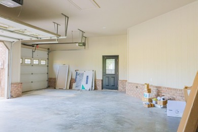 This stunning all-brick home, has been completely remodeled to on RidgePointe Country Club in Arkansas - for sale on GolfHomes.com, golf home, golf lot