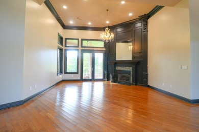 This stunning all-brick home, has been completely remodeled to on RidgePointe Country Club in Arkansas - for sale on GolfHomes.com, golf home, golf lot