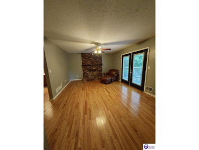 Don't miss this rare opportunity to own a beautiful brick home on Doe Valley Country Club in Kentucky - for sale on GolfHomes.com, golf home, golf lot