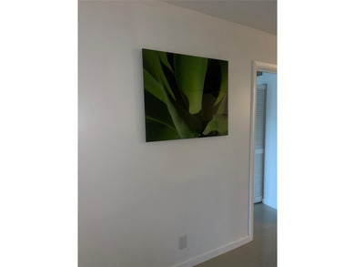 Spacious and well-maintained 2-bedroom, 2-bath condo located in on Inverrary Country Club in Florida - for sale on GolfHomes.com, golf home, golf lot