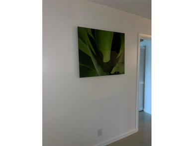 Spacious and well-maintained 2-bedroom, 2-bath condo located in on Inverrary Country Club in Florida - for sale on GolfHomes.com, golf home, golf lot