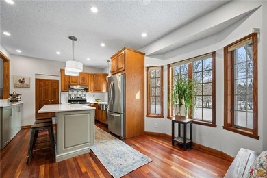 Experience the perfect blend of custom craftsmanship and modern on Indian Hills Golf Club in Minnesota - for sale on GolfHomes.com, golf home, golf lot