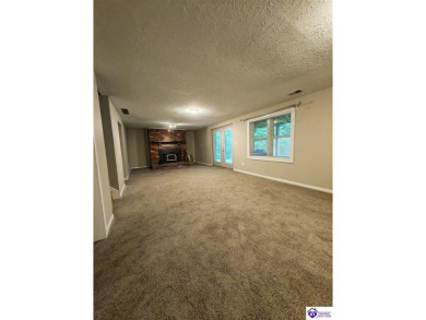 Don't miss this rare opportunity to own a beautiful brick home on Doe Valley Country Club in Kentucky - for sale on GolfHomes.com, golf home, golf lot