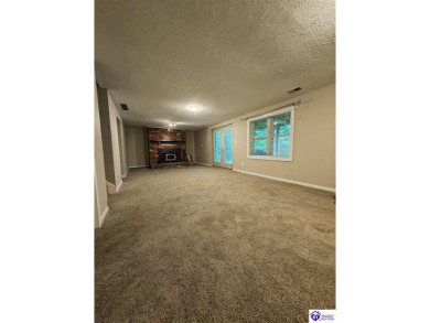 Don't miss this rare opportunity to own a beautiful brick home on Doe Valley Country Club in Kentucky - for sale on GolfHomes.com, golf home, golf lot