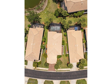 A watefront, single family detached, pool home in Trieste on Pelican Preserve Golf Club in Florida - for sale on GolfHomes.com, golf home, golf lot