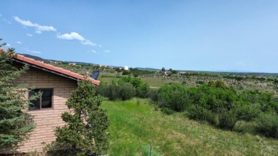 Experience the most spectacular mountain views in the area from on Hollydot Golf Course in Colorado - for sale on GolfHomes.com, golf home, golf lot