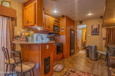 Welcome to your Smoky Mountain escape! Surrounded by mature on Bent Creek Golf Course in Tennessee - for sale on GolfHomes.com, golf home, golf lot