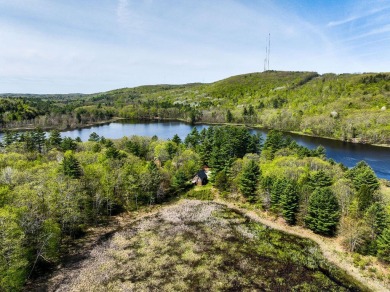 At the end of a secluded road, tucked on 7.16 acres, this on The Meadows Golf Club in Maine - for sale on GolfHomes.com, golf home, golf lot