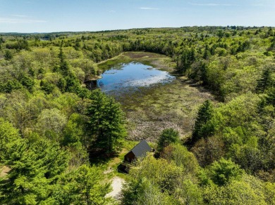 At the end of a secluded road, tucked on 7.16 acres, this on The Meadows Golf Club in Maine - for sale on GolfHomes.com, golf home, golf lot