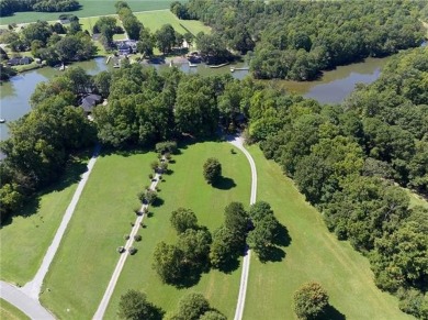 Welcome to 99 Mariners Watch Lane! This residence spans 5.21 AC on Indian Creek Yacht and Country Club in Virginia - for sale on GolfHomes.com, golf home, golf lot