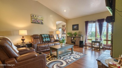 Welcome to this charming custom home on 1.11 acres with on Bell Nob Golf Course in Wyoming - for sale on GolfHomes.com, golf home, golf lot