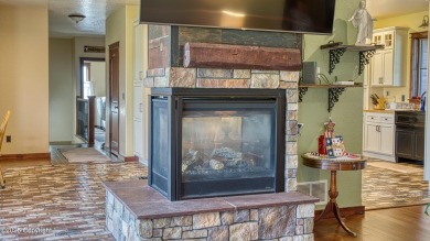 Welcome to this charming custom home on 1.11 acres with on Bell Nob Golf Course in Wyoming - for sale on GolfHomes.com, golf home, golf lot