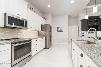 Welcome to this exceptional Paytas custom-built residence on Venetian Bay Golf Course in Florida - for sale on GolfHomes.com, golf home, golf lot