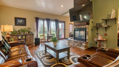 Welcome to this charming custom home on 1.11 acres with on Bell Nob Golf Course in Wyoming - for sale on GolfHomes.com, golf home, golf lot