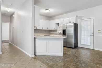 Looking for a home in a great neighborhood and a quiet setting? on Mississippi National Golf Course in Mississippi - for sale on GolfHomes.com, golf home, golf lot