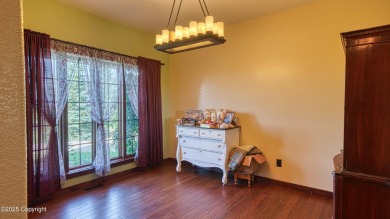 Welcome to this charming custom home on 1.11 acres with on Bell Nob Golf Course in Wyoming - for sale on GolfHomes.com, golf home, golf lot
