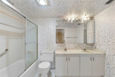 SPACIOUS 2 BED / 2 BATH LOCATED IN DESIRABLE COMMUNITY WITH on Wynmoor Golf Course in Florida - for sale on GolfHomes.com, golf home, golf lot