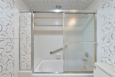 SPACIOUS 2 BED / 2 BATH LOCATED IN DESIRABLE COMMUNITY WITH on Wynmoor Golf Course in Florida - for sale on GolfHomes.com, golf home, golf lot