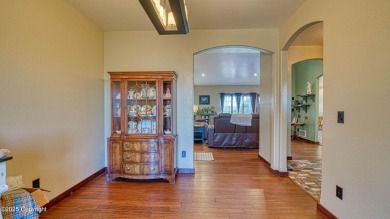 Welcome to this charming custom home on 1.11 acres with on Bell Nob Golf Course in Wyoming - for sale on GolfHomes.com, golf home, golf lot
