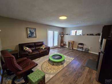 Experience this oasis on the bluff with incredible views of the on Hollydot Golf Course in Colorado - for sale on GolfHomes.com, golf home, golf lot