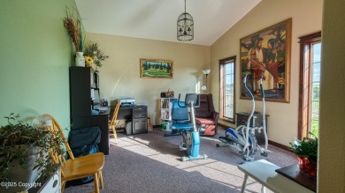 Welcome to this charming custom home on 1.11 acres with on Bell Nob Golf Course in Wyoming - for sale on GolfHomes.com, golf home, golf lot