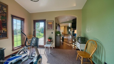 Welcome to this charming custom home on 1.11 acres with on Bell Nob Golf Course in Wyoming - for sale on GolfHomes.com, golf home, golf lot