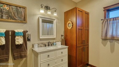 Welcome to this charming custom home on 1.11 acres with on Bell Nob Golf Course in Wyoming - for sale on GolfHomes.com, golf home, golf lot