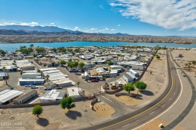 *ON LEASED LAND*

Paradise is Found! Don't judge the book by on London Bridge Golf Course in Arizona - for sale on GolfHomes.com, golf home, golf lot