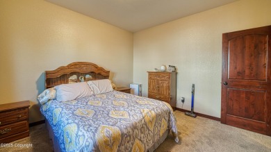 Welcome to this charming custom home on 1.11 acres with on Bell Nob Golf Course in Wyoming - for sale on GolfHomes.com, golf home, golf lot