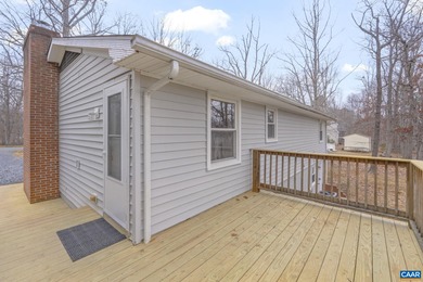 Enjoy effortless single-level living in a desirable resort-style on Lake Monticello Golf Course in Virginia - for sale on GolfHomes.com, golf home, golf lot